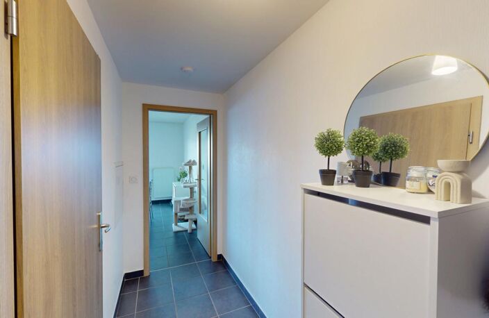 Manom : Appartement T2 de 47 m² vendu loué avec parking privatif — photo 3