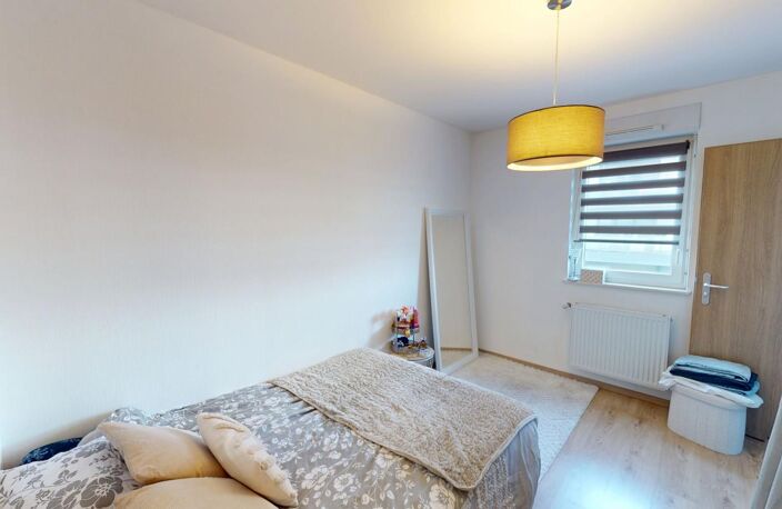 Manom : Appartement T2 de 47 m² vendu loué avec parking privatif — photo 5