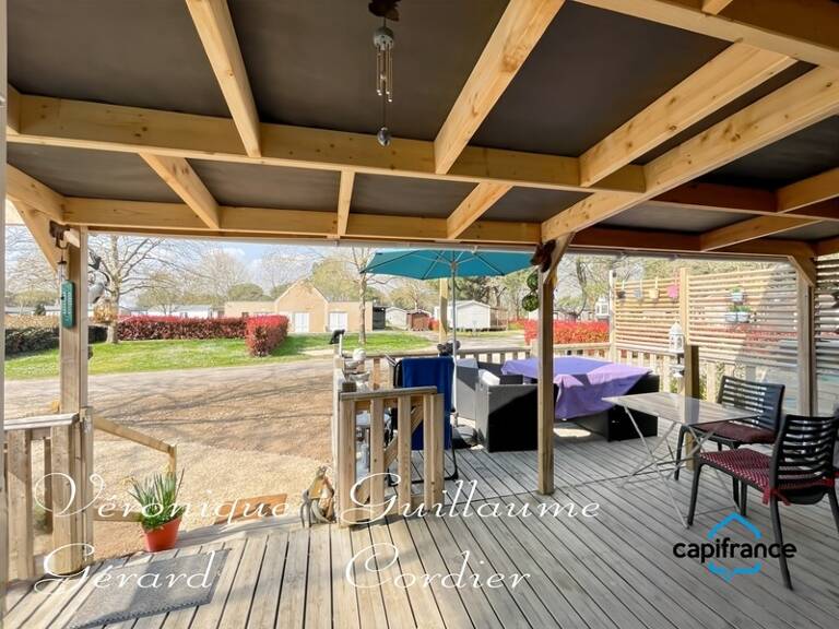 Mobil-Home de 32 M² de 2019, confortable avec belle terrasse et parcelle privative a vendre séparément en PRL — photo 1