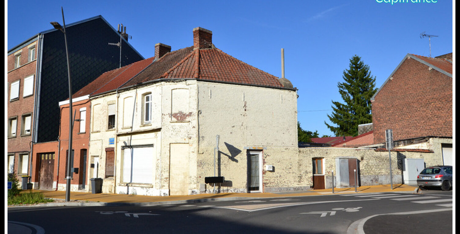 Maison de ville de 102m² en semi plain pied, 2 chambres, 1 bureau avec garage et cour — photo 1