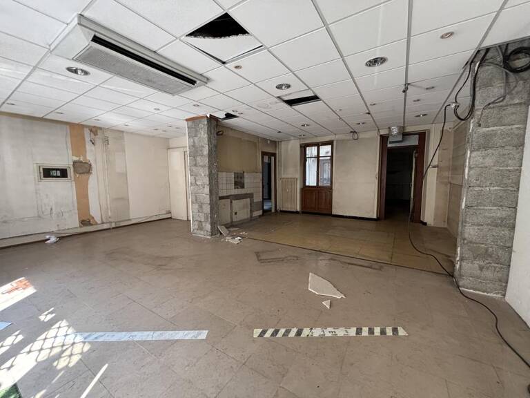 LOCAL COMMERCIAL 90m2— PIED D'IMMEUBLE — RUE POINCARÉ — photo 1