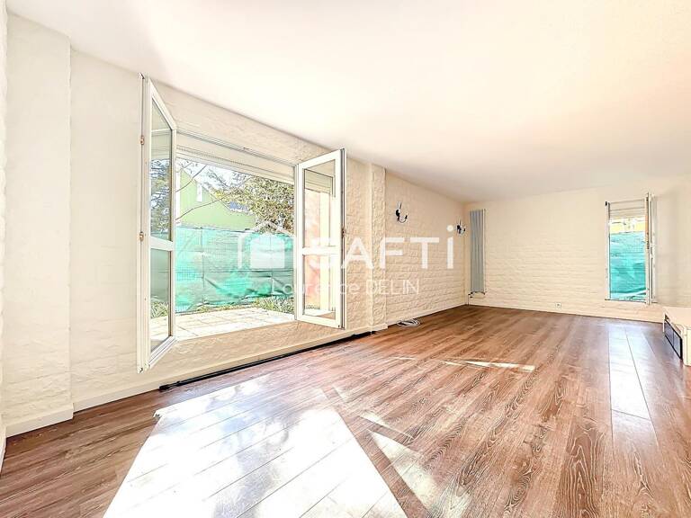 REZ DE JARDIN LUMINEUX PROCHE TOUTES COMMODITES — photo 1
