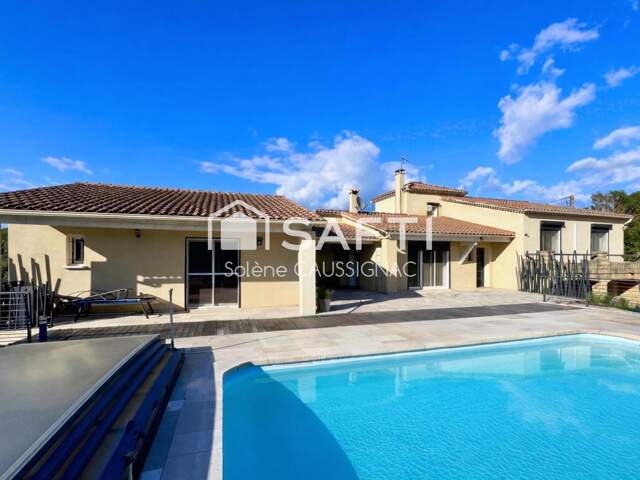 Maison rénovée de 188 m², 5 chambres, piscine, 3 grands garages — photo du bien