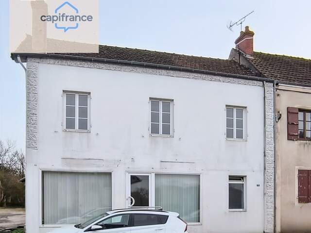 Immeuble  au cœur du bourg – Fort potentiel d’aménagement — photo du bien