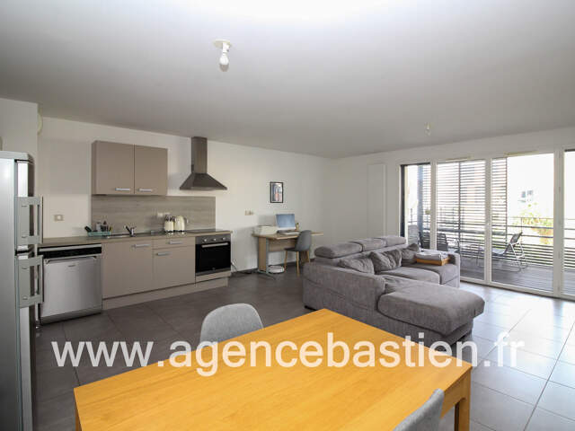 Divonne-les-Bains   T3 de 73 m2 avec terrasse et garage — photo du bien