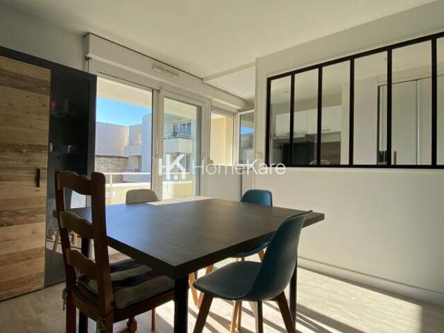 A VENDRE T2 CHARTRONS AVEC BALCON ET STATIONNEMENT — photo du bien