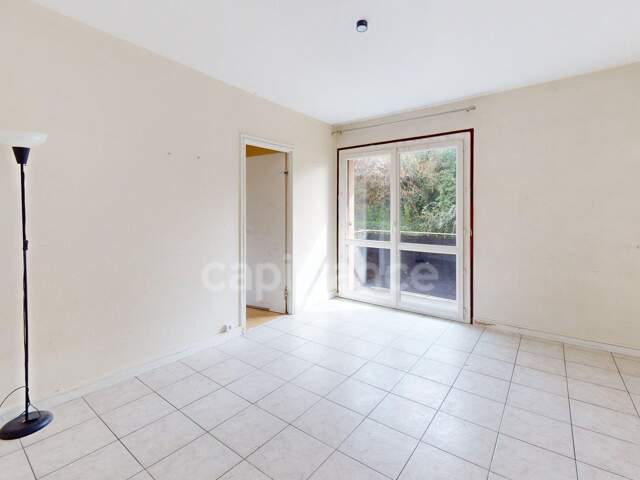 3 pièces 58 m² avec balcon et cave, proche gare — photo du bien