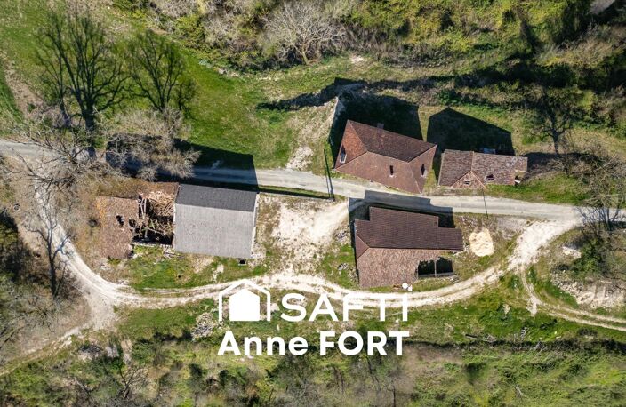 Ferme en pierre à rénover d'environ 132 m2 avec trois dépendances et terrain de 2500 m2 — photo 2