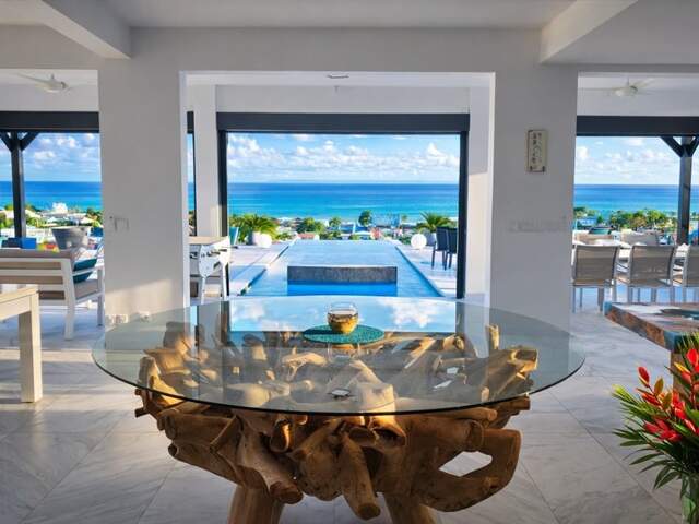 A VENDRE - PROPRIÉTÉ CONFIDENTIELLE – VILLA CONTEMPORAINE – VUE MER ABSOLUE – PRESTATIONS SIGNATURE - SAINT FRANCOIS — photo du bien