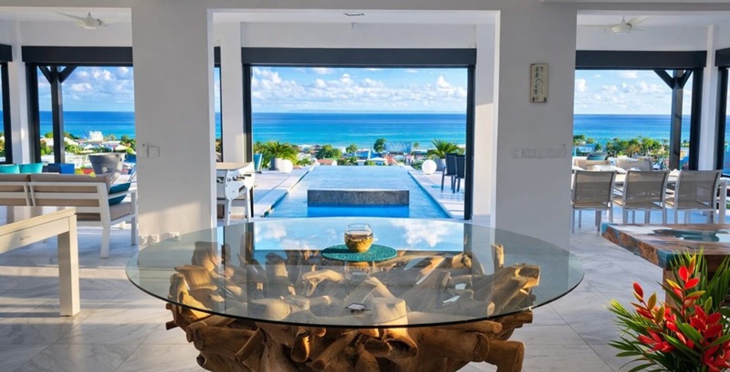 A VENDRE - PROPRIÉTÉ CONFIDENTIELLE – VILLA CONTEMPORAINE – VUE MER ABSOLUE – PRESTATIONS SIGNATURE - SAINT FRANCOIS — photo 1