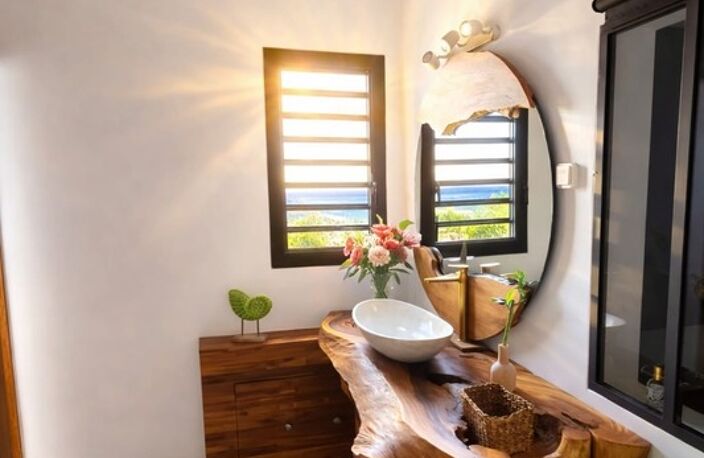 A VENDRE - PROPRIÉTÉ CONFIDENTIELLE – VILLA CONTEMPORAINE – VUE MER ABSOLUE – PRESTATIONS SIGNATURE - SAINT FRANCOIS — photo 5