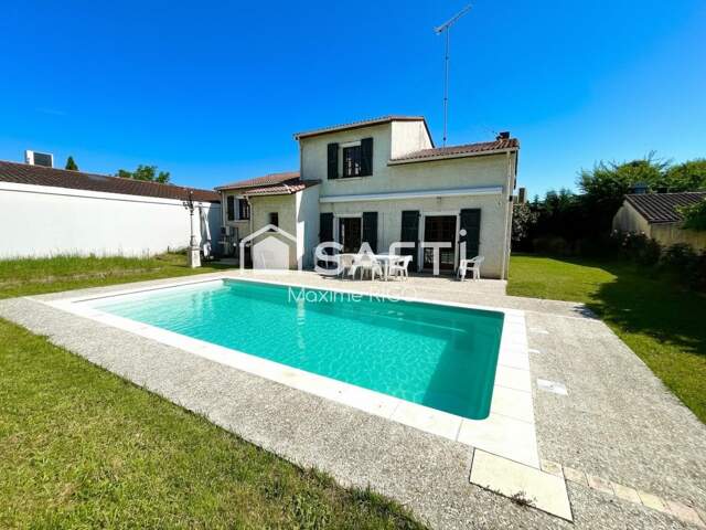 Villa 8 pièces 163m² avec piscine en centre-ville — photo du bien