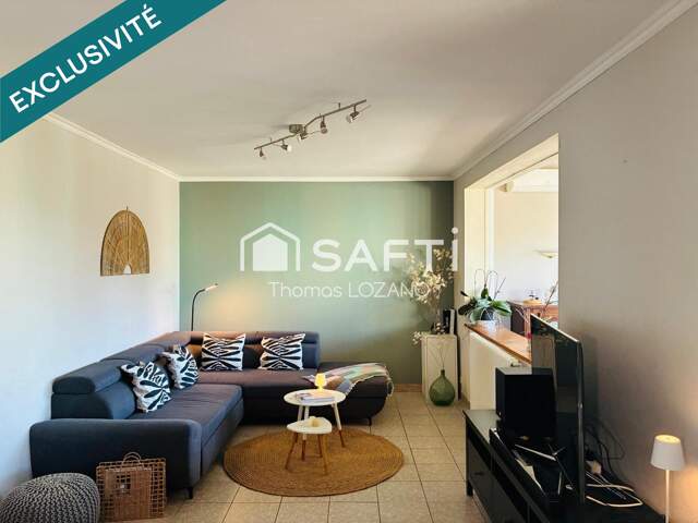 Maison familiale de 112 m² avec jardin, sous-sol et pompe à chaleur — photo du bien