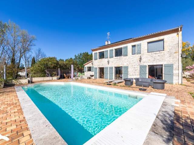 Maison en pierre de 10 pièces principales — photo du bien