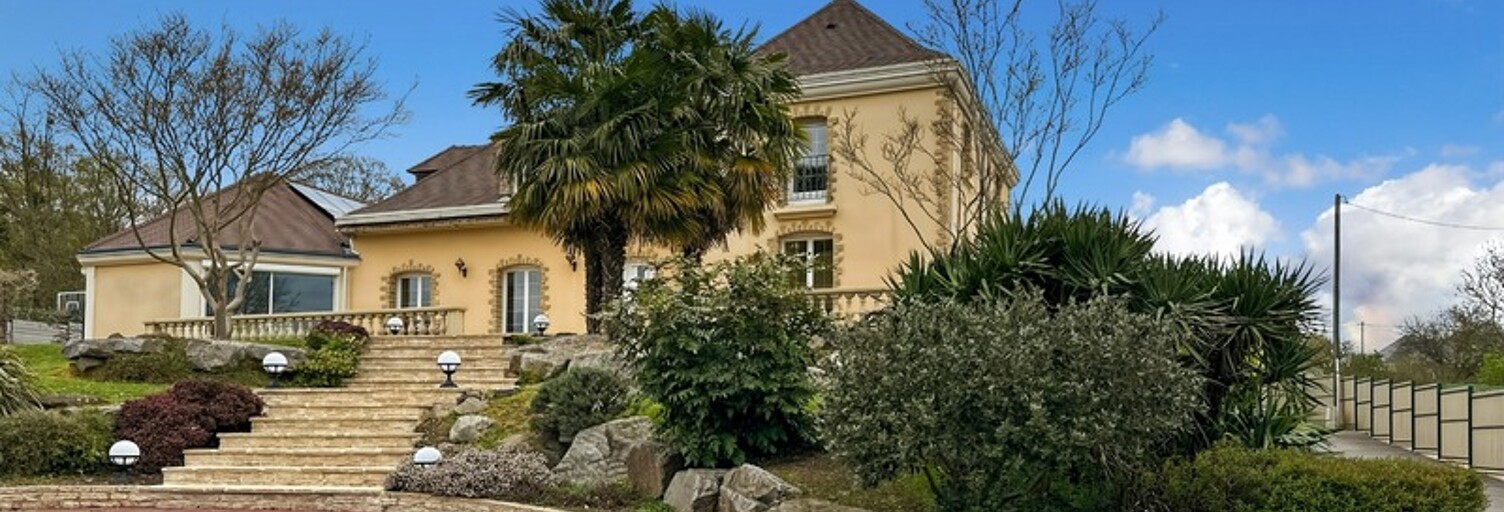 Maison 8 Pièces 237 m² à vendre à Aigné (72650)