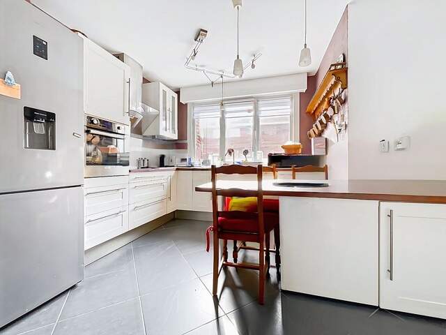 MAISON SEMI-MITOYENNE - GARAGE -  4 CHAMBRE - 100 m² - COMINES — photo du bien