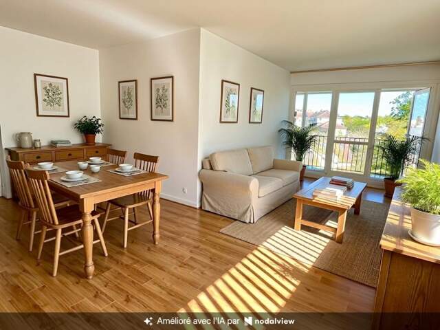 Appartement  de 111m², 3 chambres, balcon, 2 box et une cave — photo du bien