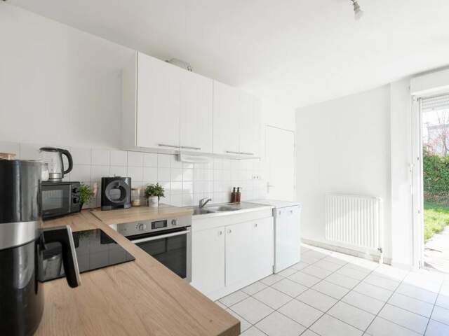 Appartement moderne 104m² avec jardin à Reims — photo du bien