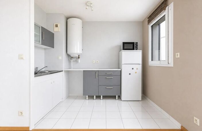 Chaleureux T2 de 42m² avec balcon vendu loué — photo 5