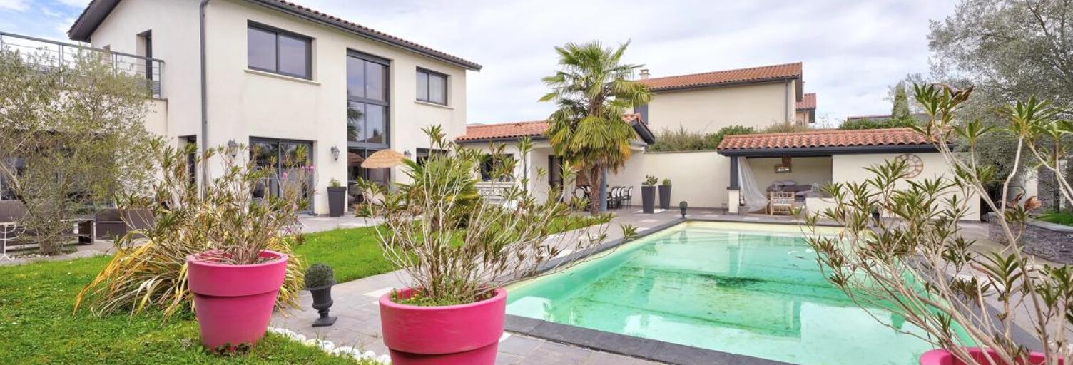 Maison 8 Pièces 210 m² à vendre à Quincieux (69650)