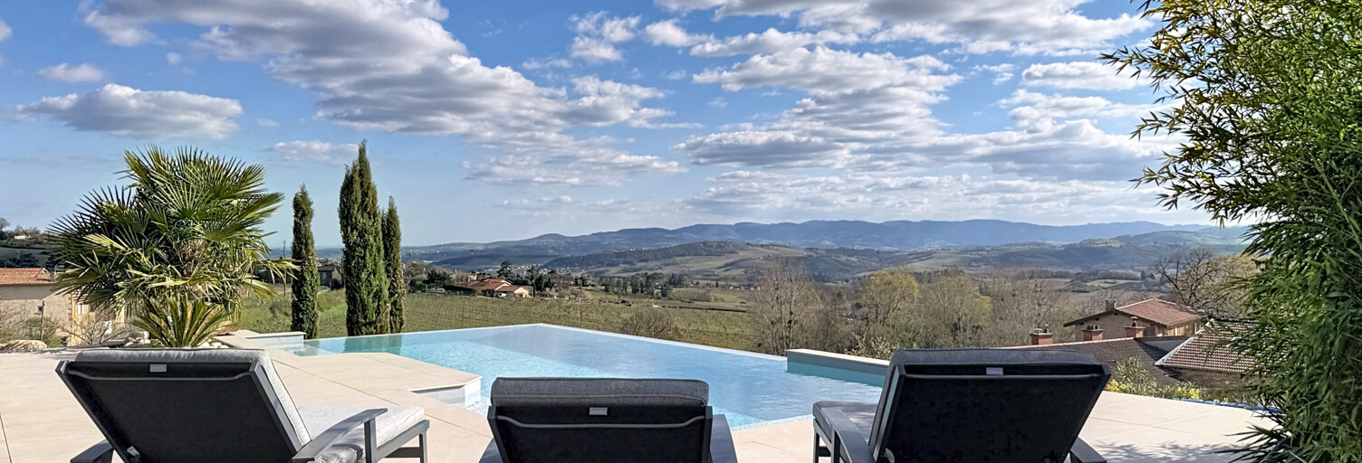 Maison 7 Pièces 195 m² à vendre à Moiré (69620)