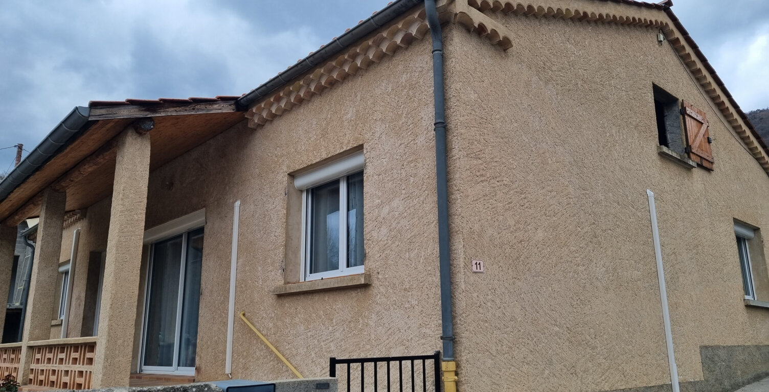 Maison de village de plain pied avec garage — photo 1