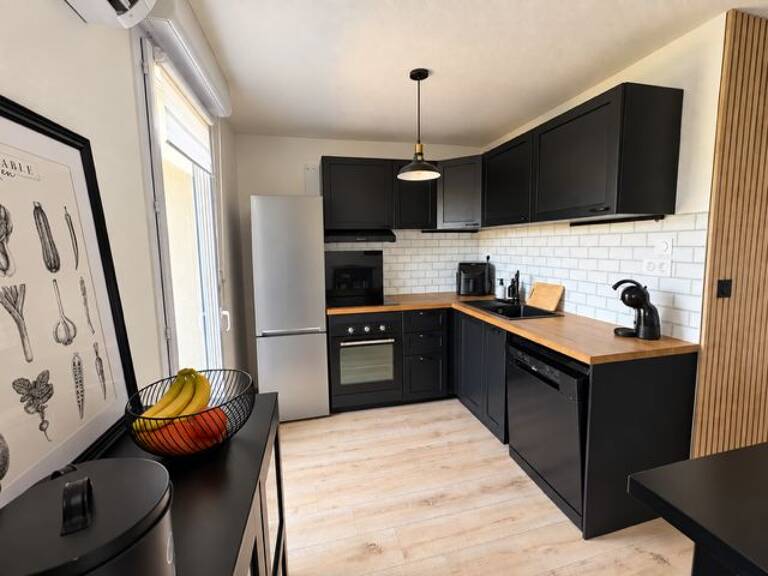 Appartement T2 avec terrasse jardin et parking sécurisé — photo 1