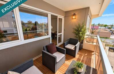 Grand appartement T3 de 83 m2 avec balcon et garage fermé. — photo du bien