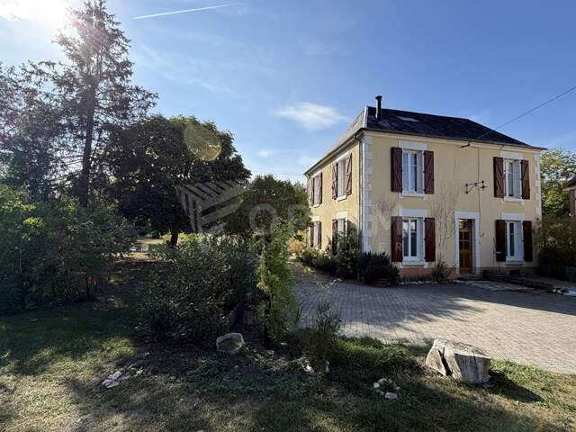 Maison de caractère de 160 m² avec parc arboré — photo du bien