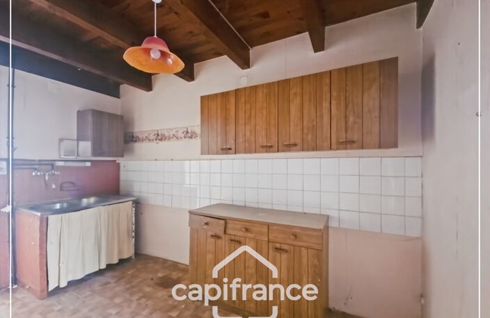 Maison en pierre à rénover avec cour et garage au cœur de Puymirol — photo 2