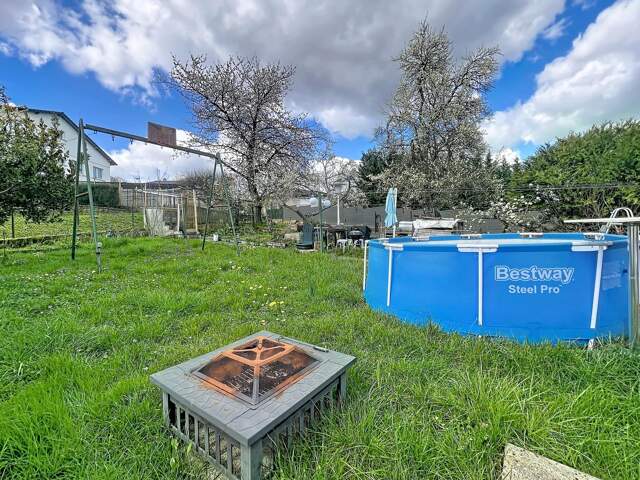 À Clouange, maison lumineuse de 127 m² avec jardin et garage — photo du bien