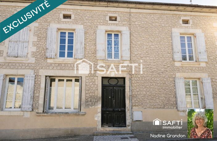 Idéalement placée, maison avec cour et garage — photo 2