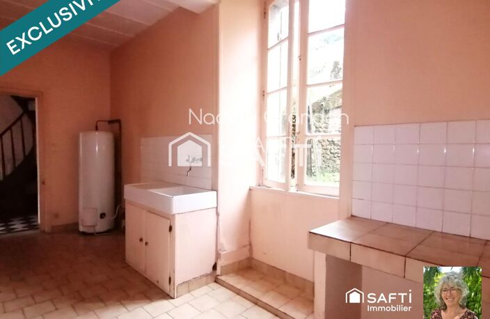 Idéalement placée, maison avec cour et garage — photo 5