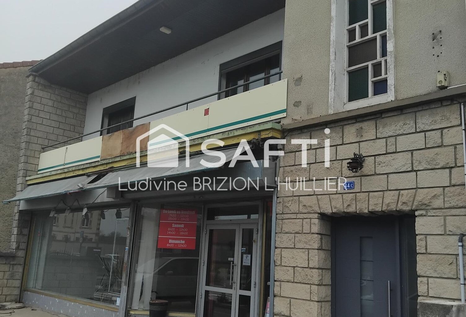 Espace commercial et logement familial. — photo 1