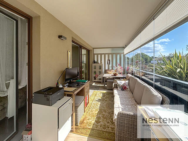 Appartement 3 pièces avec terrasse et garage en résidence récente — photo du bien