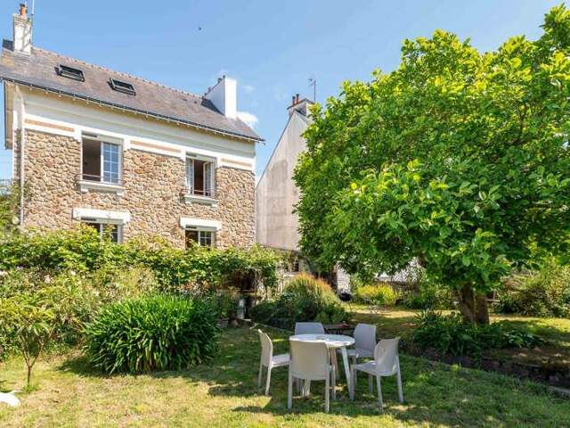 Maison de ville de 6 pièces principales — photo du bien