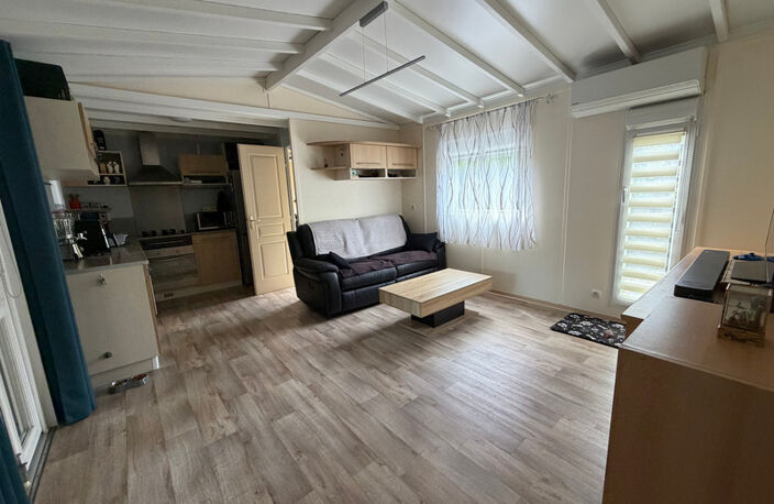SAINT CYR EN TALMONDAIS (85) DANS RESIDENCE AVEC PISCINE CHALET BOIS 3 CHAMBRES AVEC VERANDA ET JARDIN — photo 5
