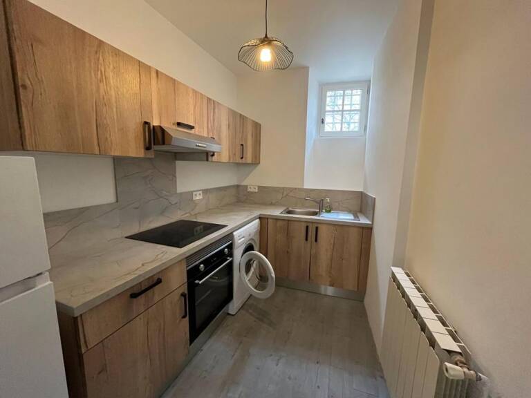 Ensemble immobilier idéalement situé en centre-ville, composé de deux logements à vocation locative — photo 1