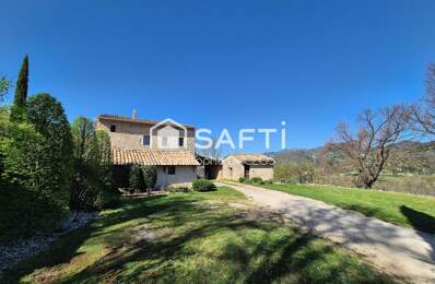 Spacieuse bastide en pierres avec dépendances et jardin paysager. — photo du bien