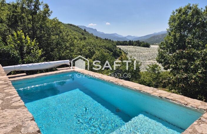 Spacieuse bastide en pierres avec dépendances et jardin paysager. — photo 3