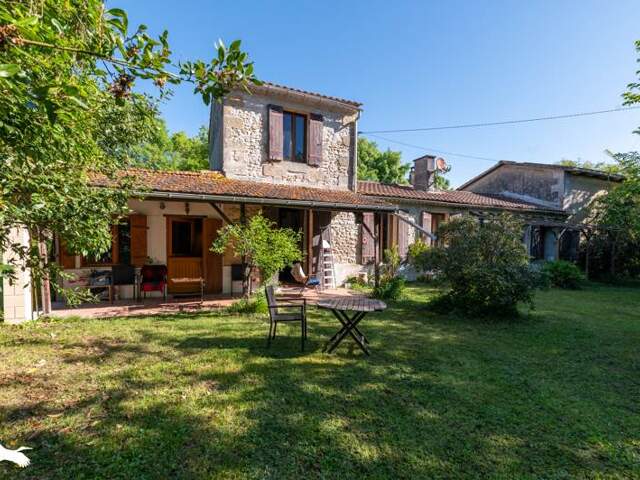 Maison en pierre de 7 pièces principales — photo du bien