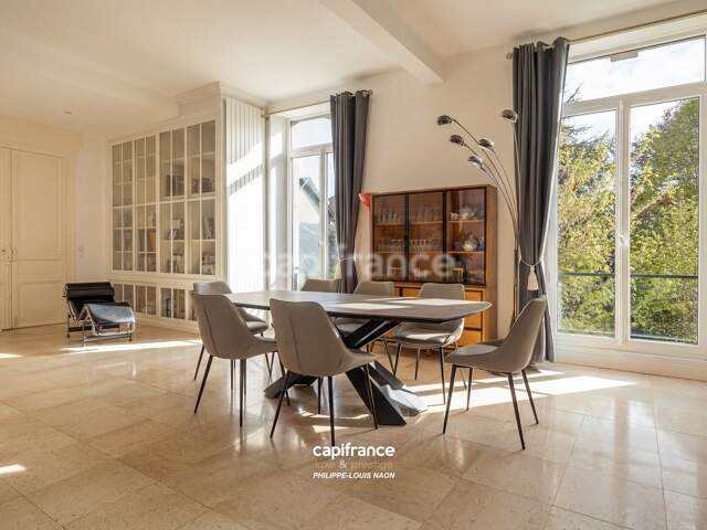 APPARTEMENT DE STYLE HAUSSMANNIEN D'EXCEPTION AVEC GRANDE PIÈCE À VIVRE DE PLUS DE 70M2 — photo du bien