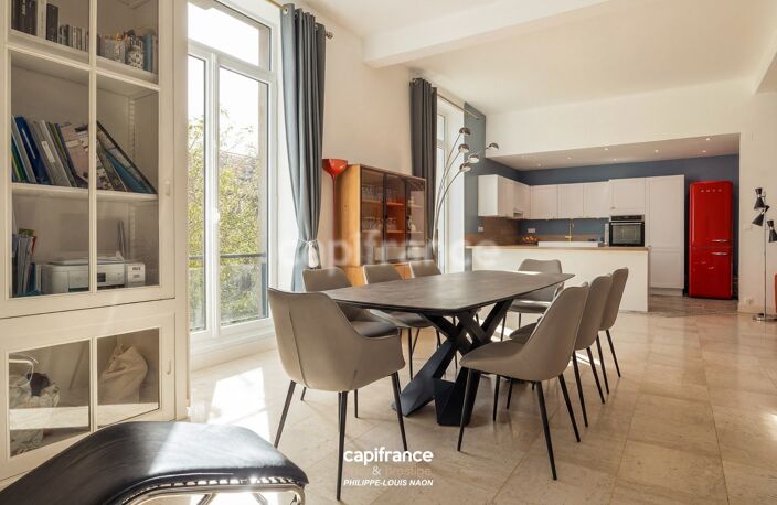 APPARTEMENT HAUSSMANNIEN D'EXCEPTION AVEC GRANDE PIÈCE À VIVRE DE PLUS DE 70M2 — photo 2