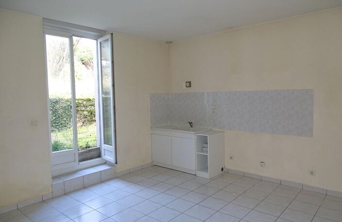 Immeuble comprenant 4 appartements + caves, jardin et parkings — photo 5