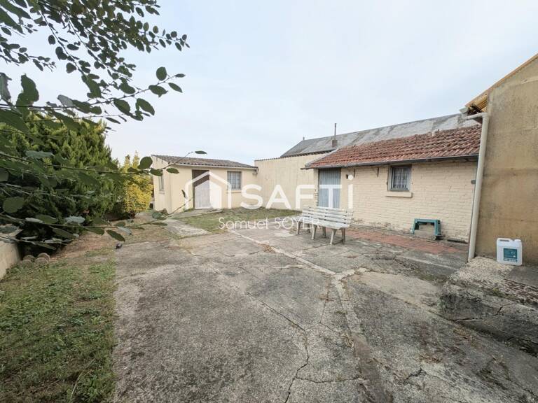 MAISON AVEC GARAGE ET JARDIN PROCHE COMMERCES — photo 1