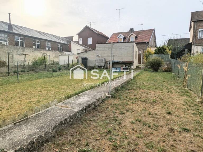 MAISON AVEC GARAGE ET JARDIN PROCHE COMMERCES — photo 1