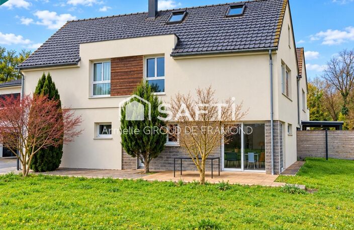 Située à Kembs (68680), cette maison, semi-mitoyenne de 125 m2, 6 pièces, 4 chambres, sur 437 m2 de terrain clôturé, belle terrasse et jardin avec vue dégagée. — photo 4