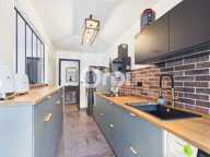 CENTRE VILLE - DOUBLE GARAGE - PROXIMITÉ COMMERCES - ORIENTE OUEST — photo 4
