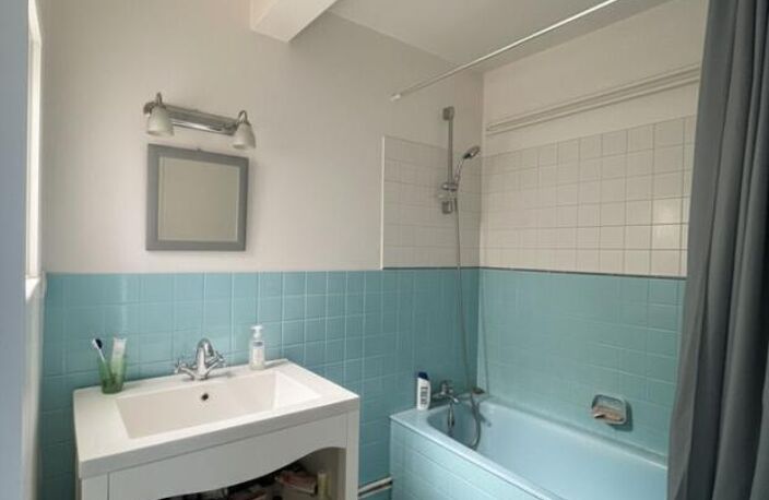 Appartement T2 avec balcon, parking et caves — photo 4