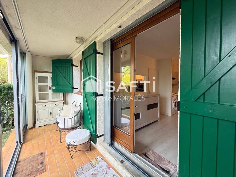 SAINT-CYPRIEN (66),T2 AVEC JARDIN DANS RESIDENCE SECURISEE,PISCINE ET STATIONNEMENTS — photo 1